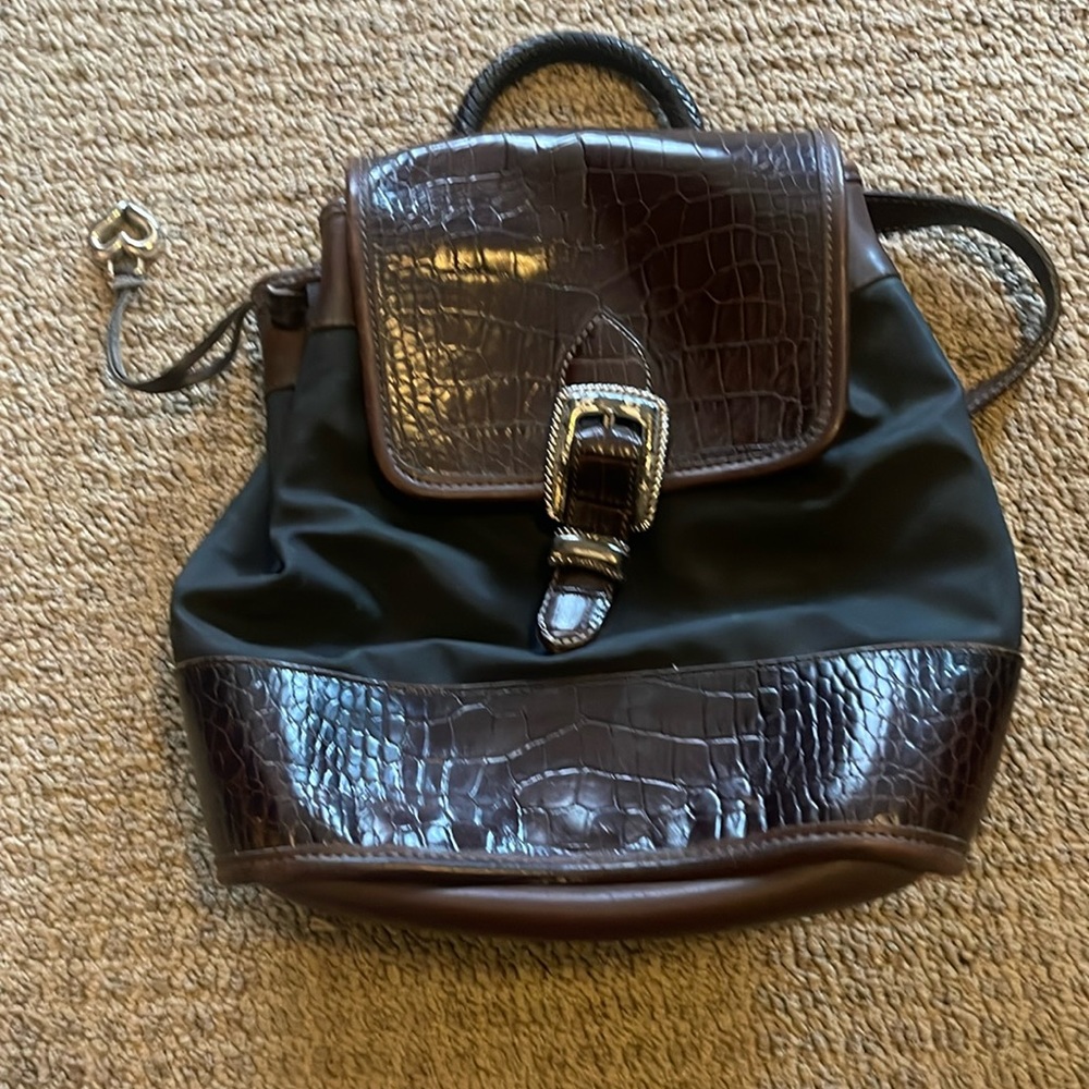 Brighton Backpack- Brown Leather with/black trim.  Notice wear on silver buckle